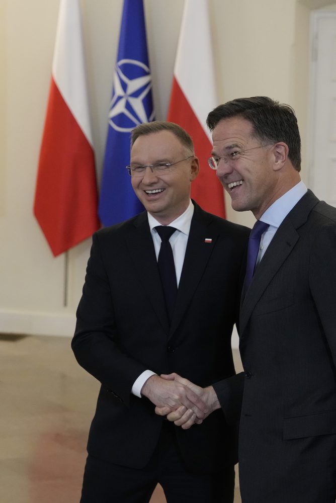 Generálny tajomník NATO Mark Rutte a poľský prezident Andrzej Duda